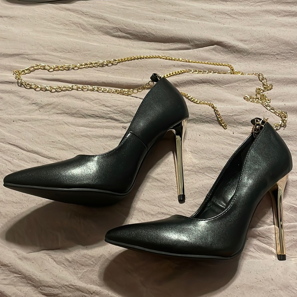 Black and gold heels